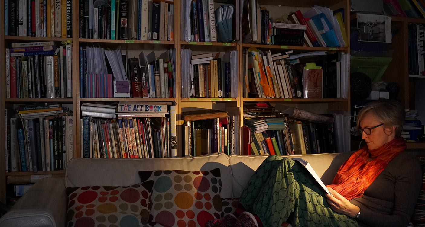 Reading amongst a vast libary